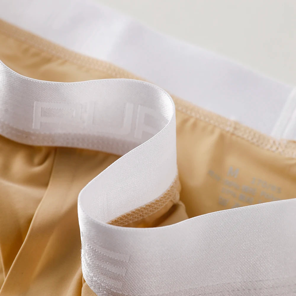 Men’s Ice Silk Ultra-Thin Briefs with Raised Comfort Pouch by Gallery Man